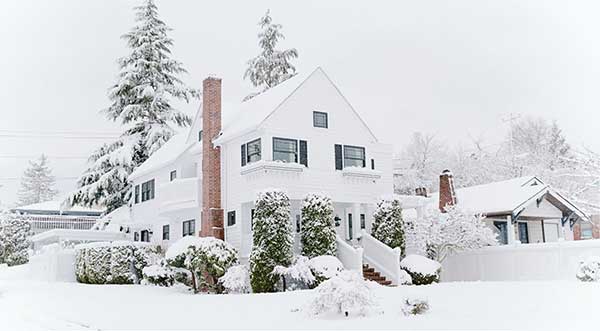 snow covered home